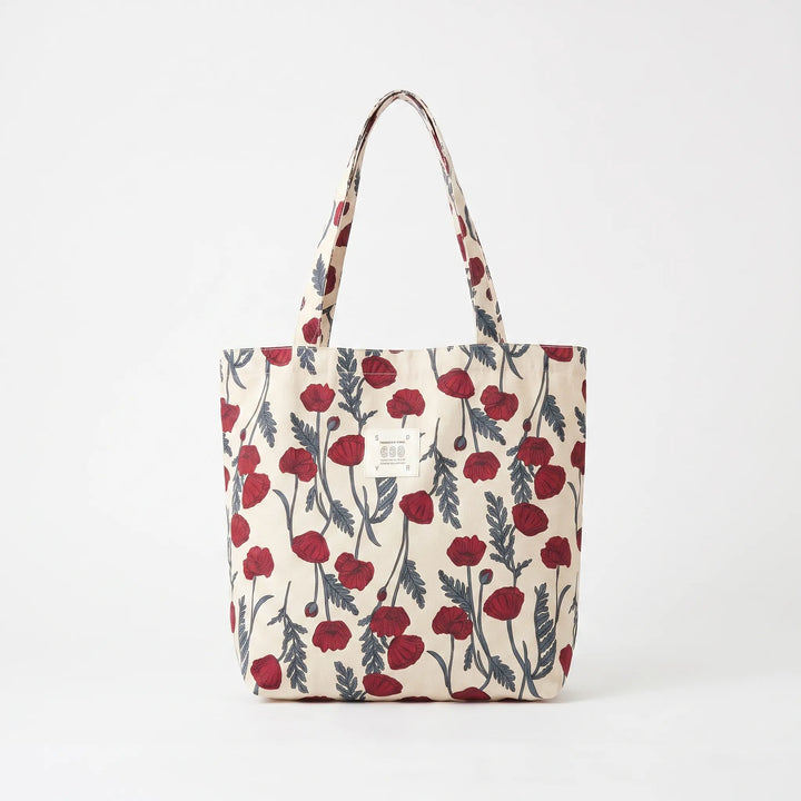 Spacious women's printed tote bag, a large shoulder accessory with colorful floral design for daily essentials.