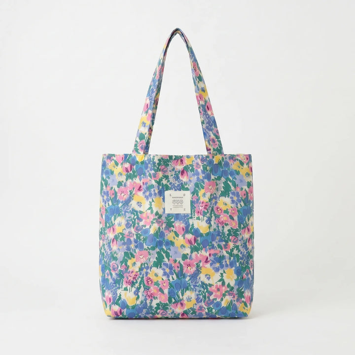 Versatile women's printed tote bag, a large soft shoulder accessory with a colorful floral design for various occasions.