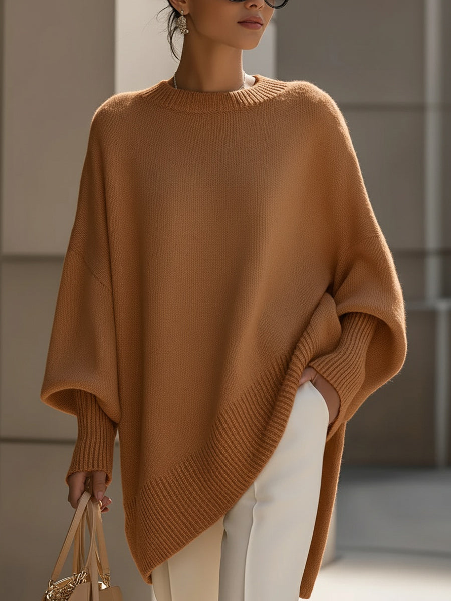 Textured women's oversized knit sweater, a cozy top for elegant casual wear.