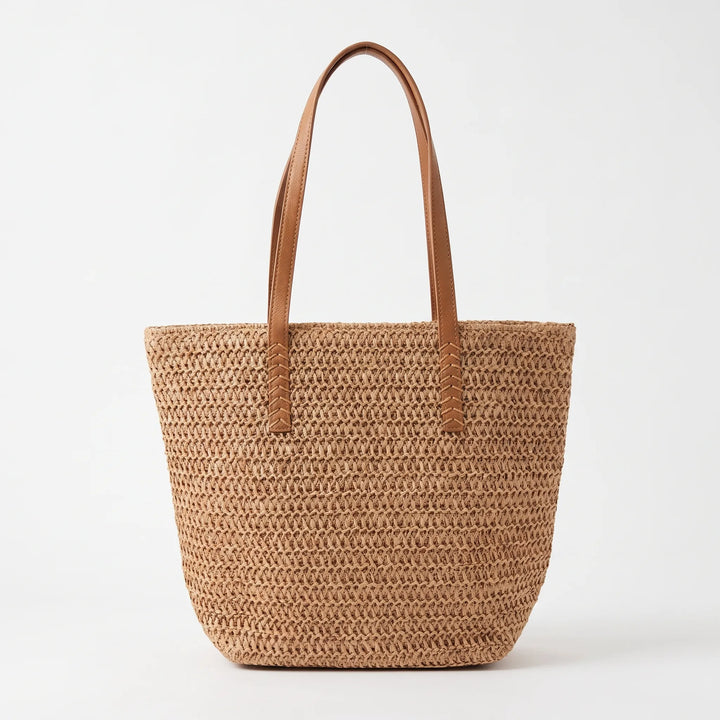 Women's roomy woven tote, great for travel & daily use. Durable, stylish shoulder bag for all your summer needs.