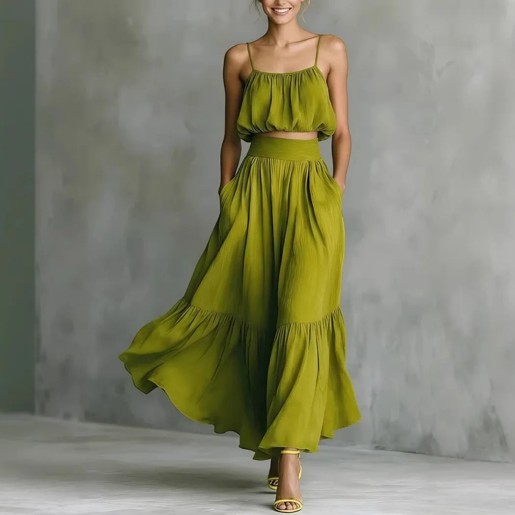 Women's spaghetti strap crop top and ruffle maxi skirt set. Perfect for beach holidays & summer vacations.