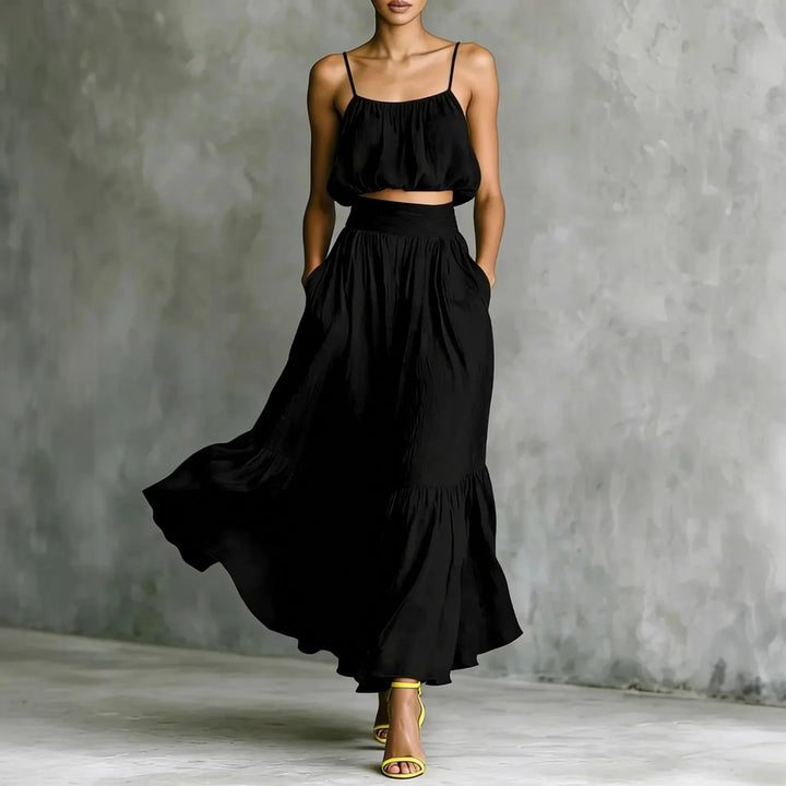 Casual chic women's clothing set: spaghetti strap crop top & long ruffle maxi skirt. Ideal for summer holidays.