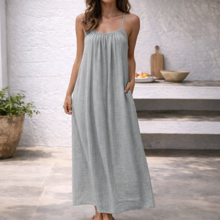 Relaxed fit women's spaghetti strap maxi sundress, designed for easy summer style & everyday wear.