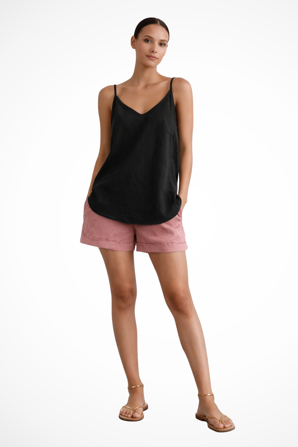 Versatile women's spaghetti strap tank top, a key piece of womens apparel for casual and summer fashion.