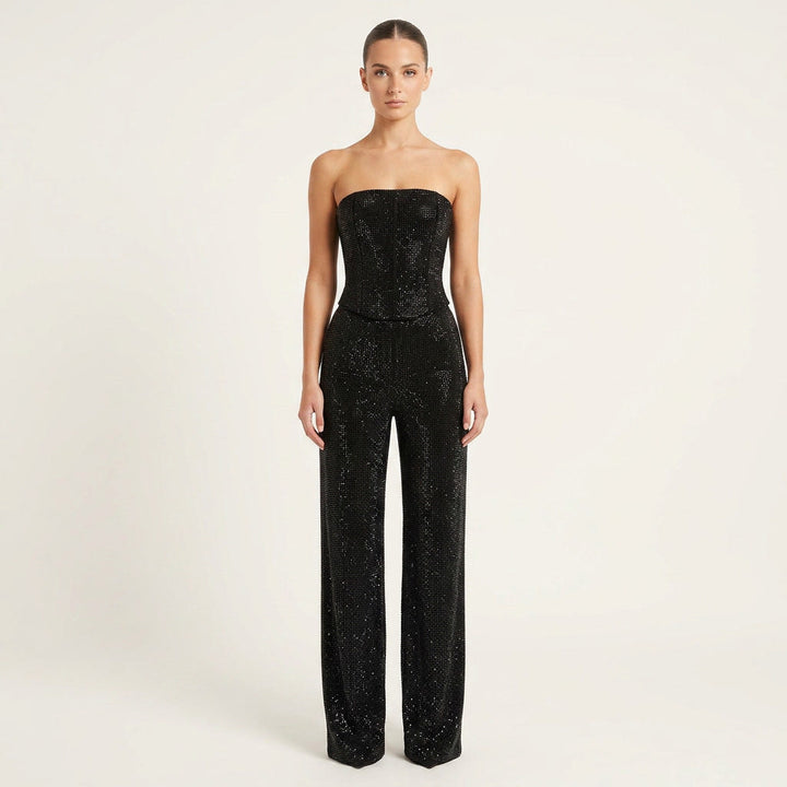 Women's sparkling glitter crop top & high-waist jeans set. Perfect for party wear.