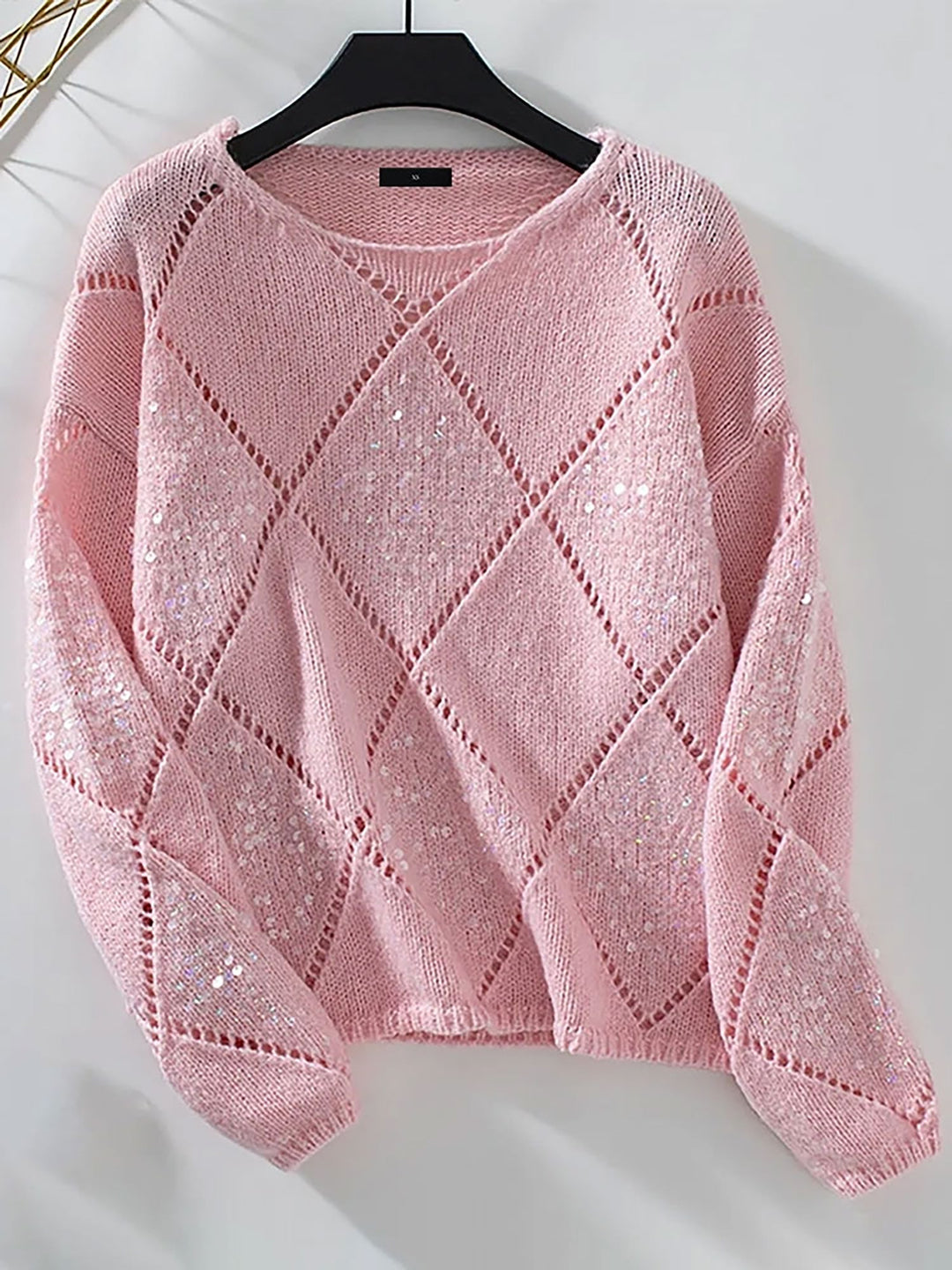 Women's sparkling knit sweater with sequin diamond pattern, crew neck, festive holiday top.