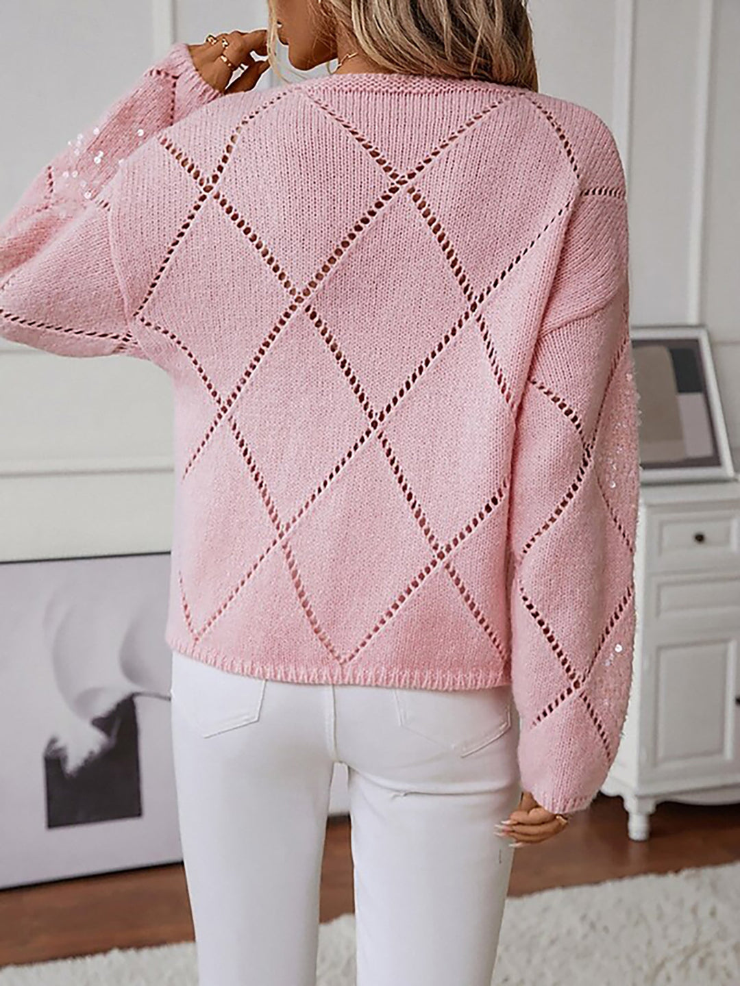 Women's crew neck sequin knit sweater with shimmering diamond pattern, elegant top.