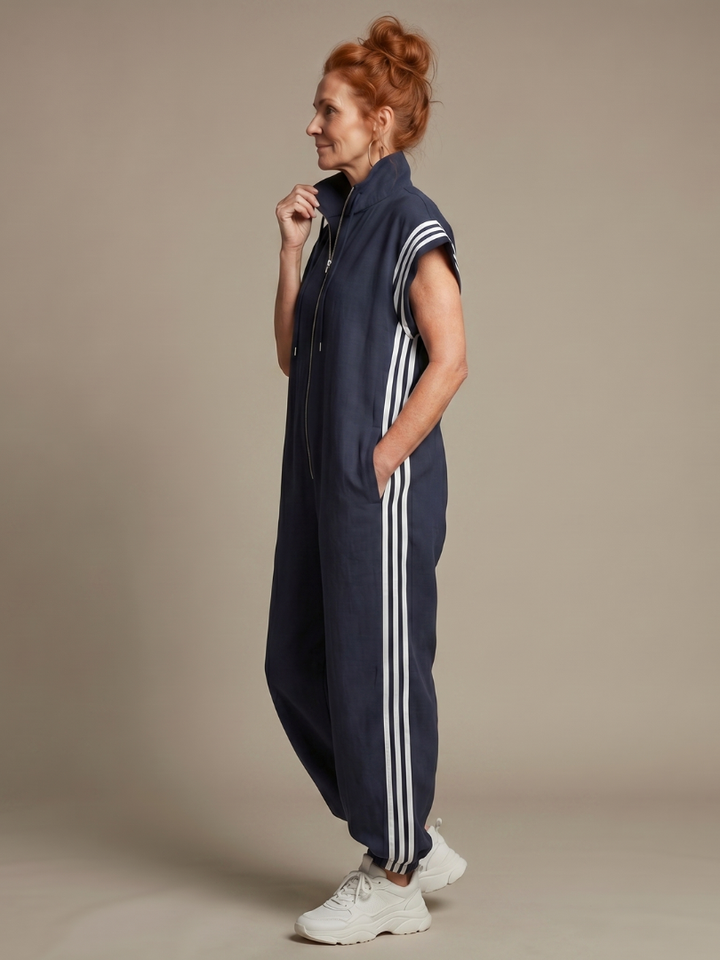 Comfortable women's sporty full-length jumpsuit with stylish side stripe and zip front.