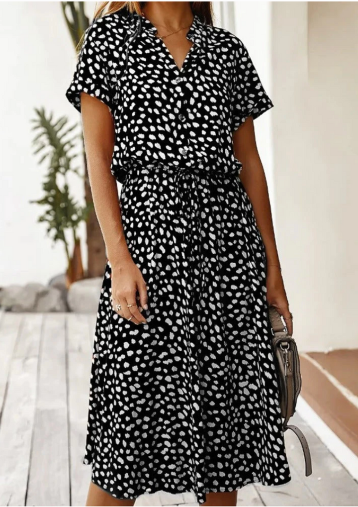 Casual women's spotted midi dress, V-neck & adjustable waist for spring.