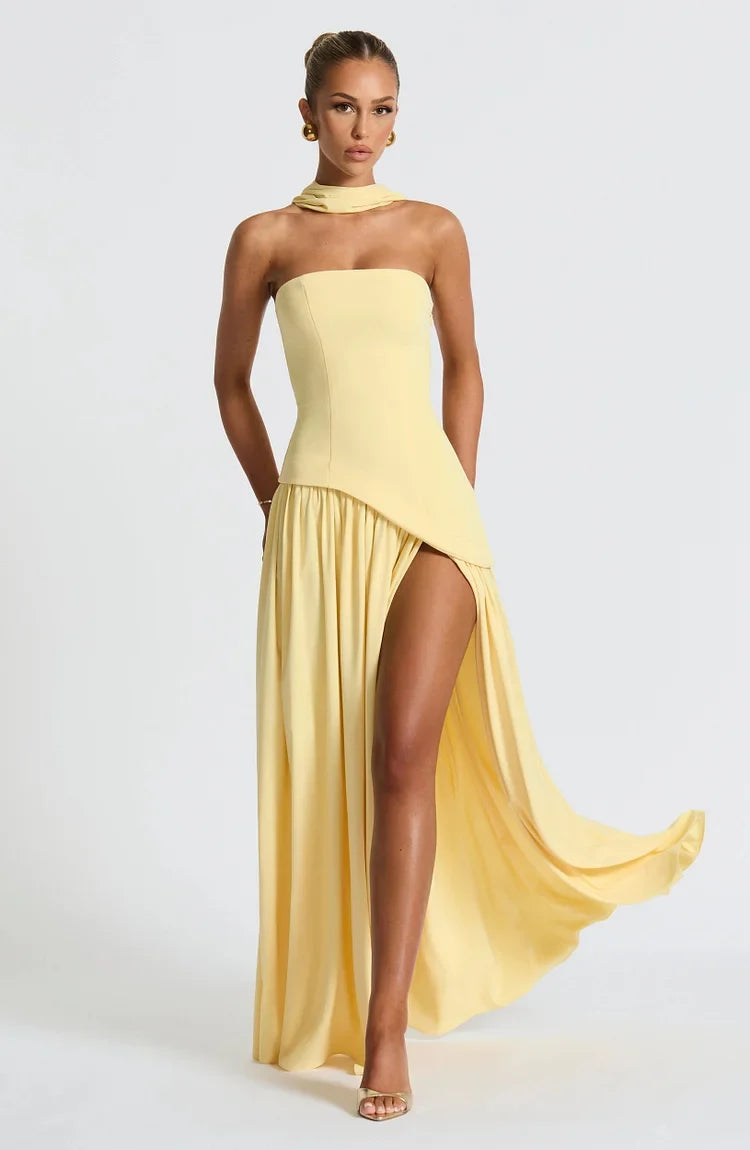 Women's strapless asymmetric hem maxi dress, exuding evening glamour.