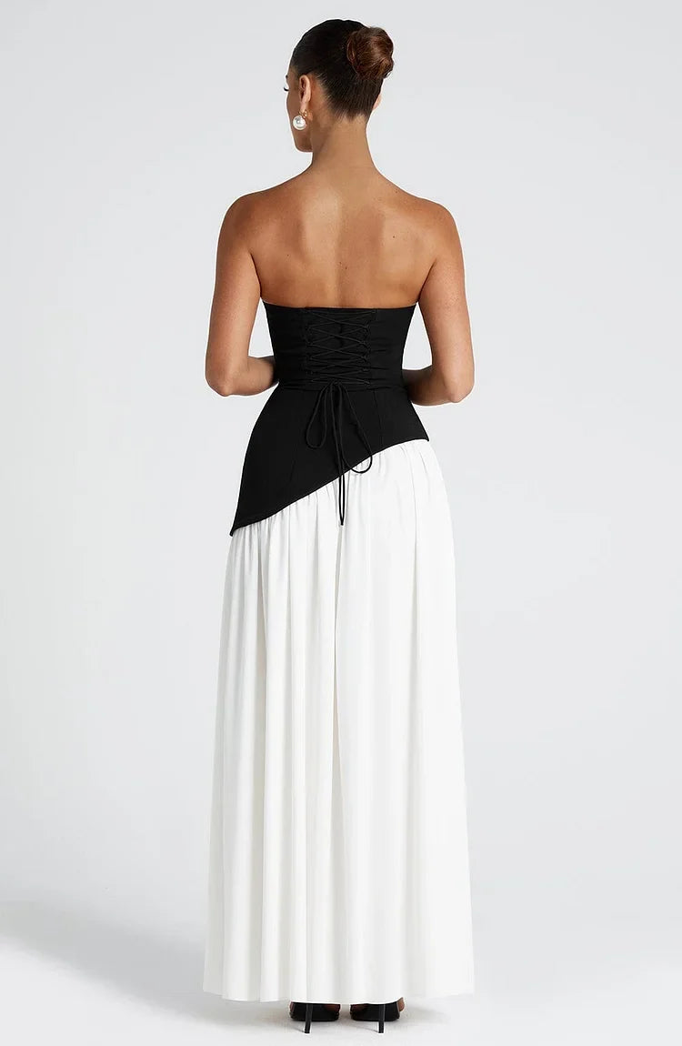 Elegant women's strapless maxi dress with an asymmetric hem, ideal for formal events.