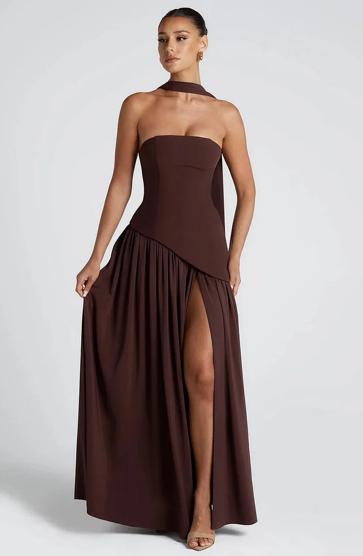 Full-length strapless asymmetric maxi dress featuring a stylish high slit.