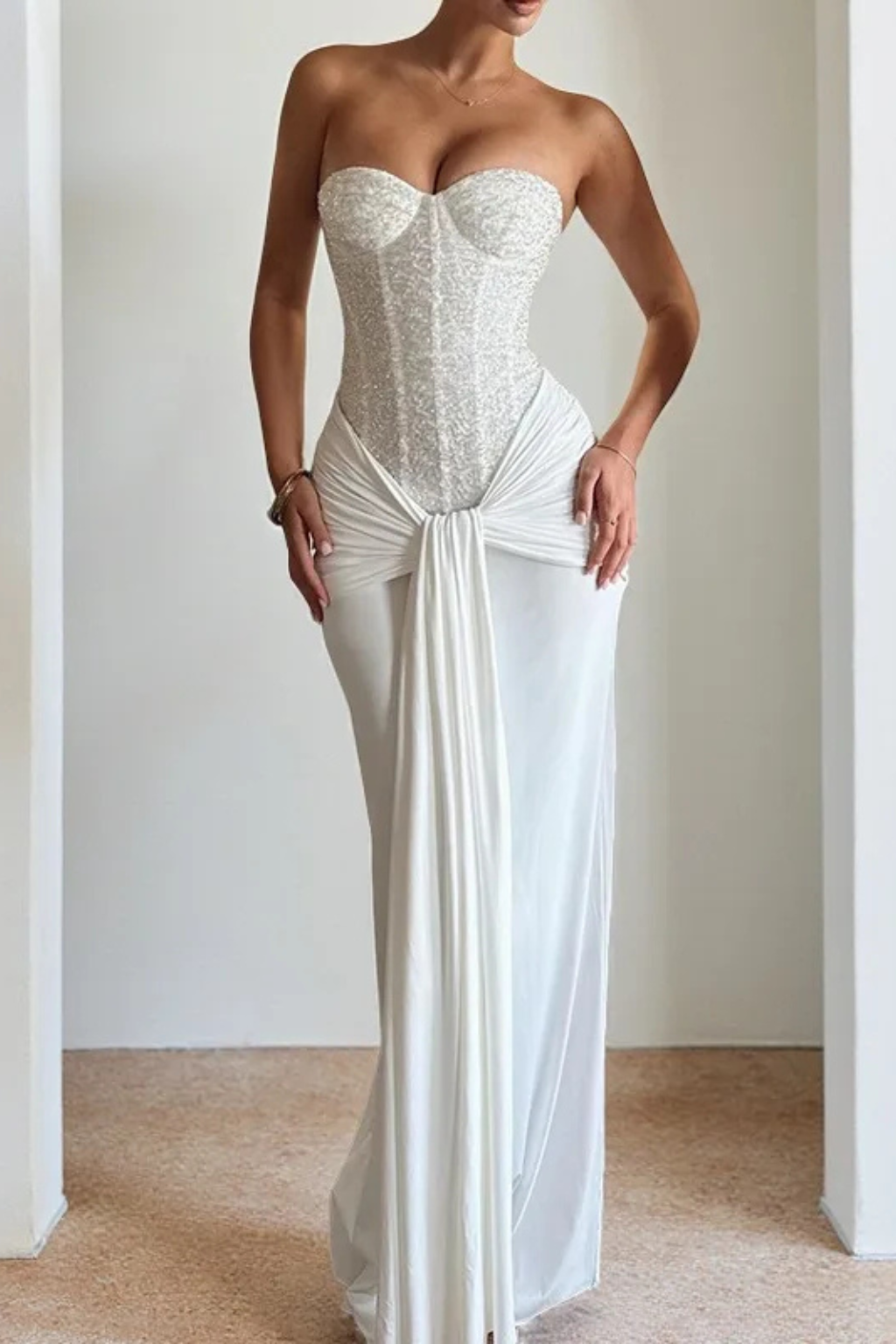 Women's elegant strapless corset mermaid maxi gown, flattering silhouette for formal events.