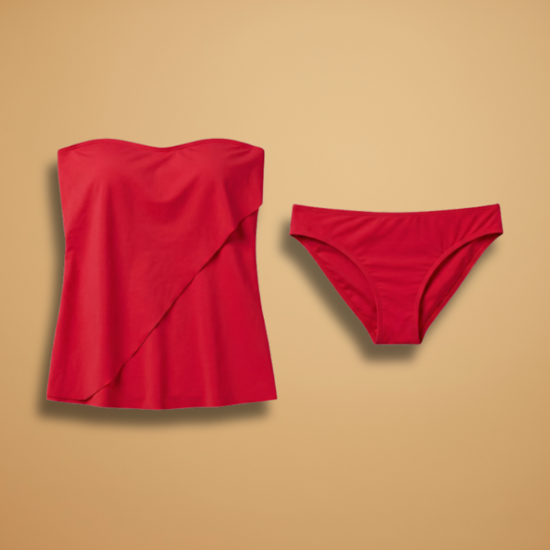 Flattering womens bandeau tankini swimsuit with ruffle overlay, two-piece swimwear.