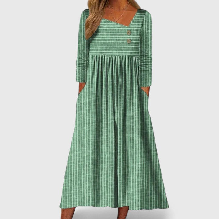 Casual women's long sleeve striped midi dress featuring practical pockets & stylish button front, versatile A-line fit.