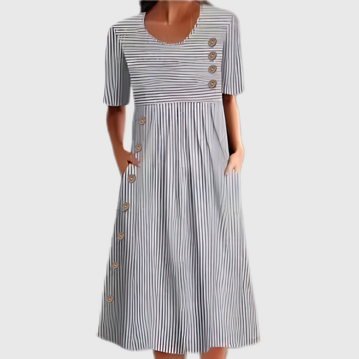 Relaxed fit women's striped midi dress with elegant side buttons, ideal for versatile daily wear and comfort.