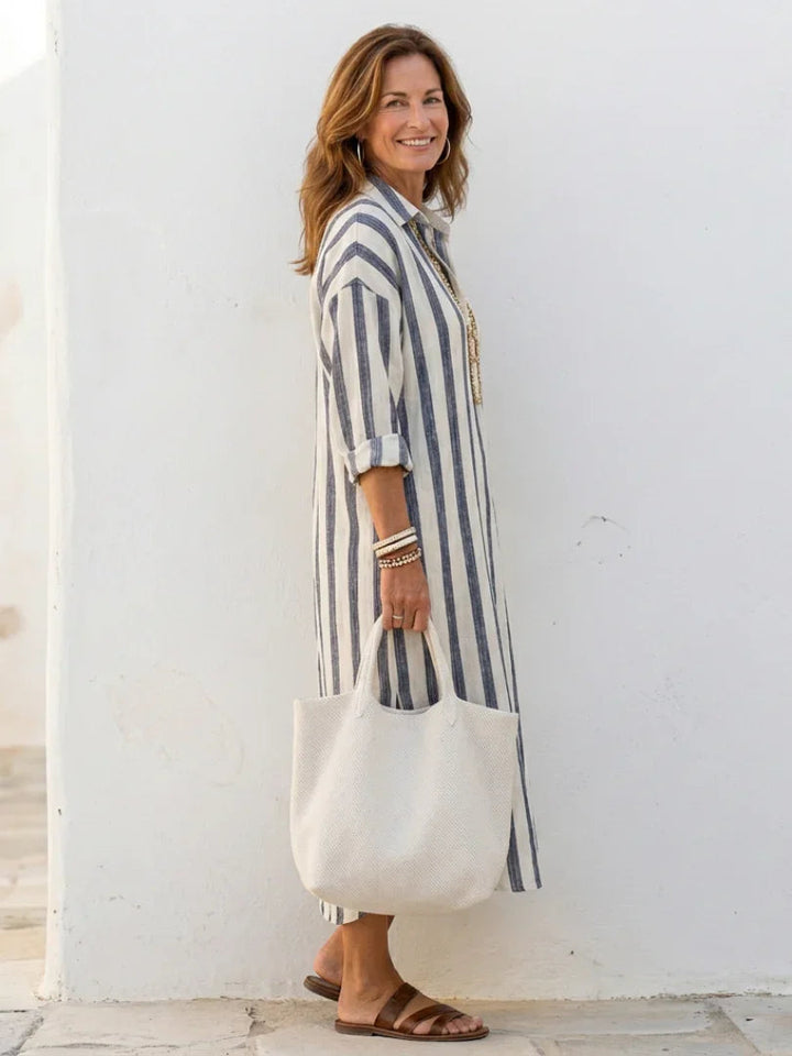 Relaxed fit women's striped midi shirt dress, button front, long sleeve. Perfect for versatile fashion.