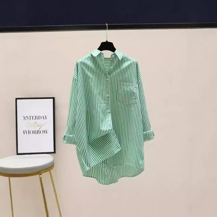 Chic women's striped oversized button down shirt, great for effortless casual spring outfits.