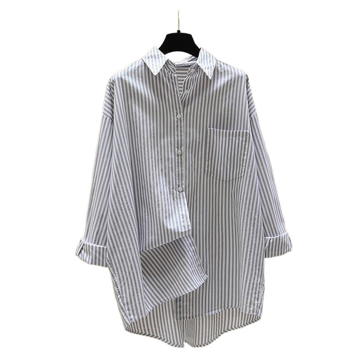 Effortless women's oversized striped button down shirt, a versatile piece for summer & fall style.