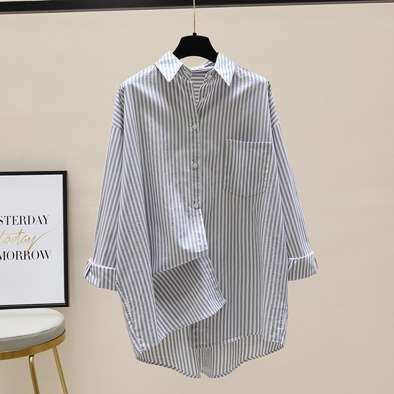 Women's striped oversized button down shirt, a stylish & versatile top for all seasons.