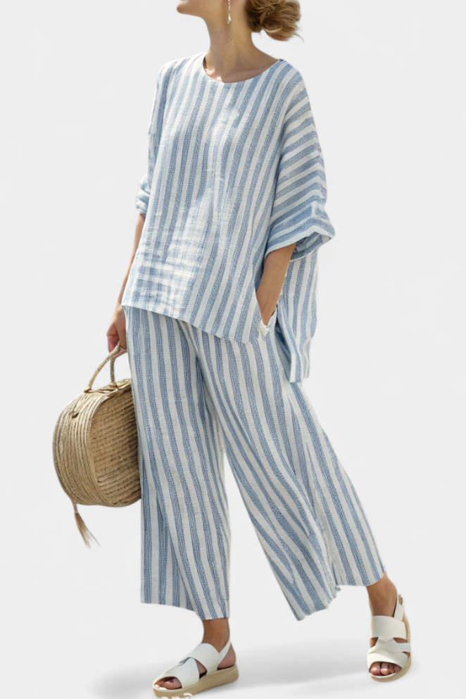 Women's striped oversized top & wide leg pant set. Comfortable two-piece summer fashion for casual or resort wear.