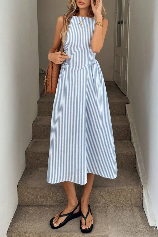 Women's striped pleated halter neck midi dress, perfect for summer elegance & vacation wear.