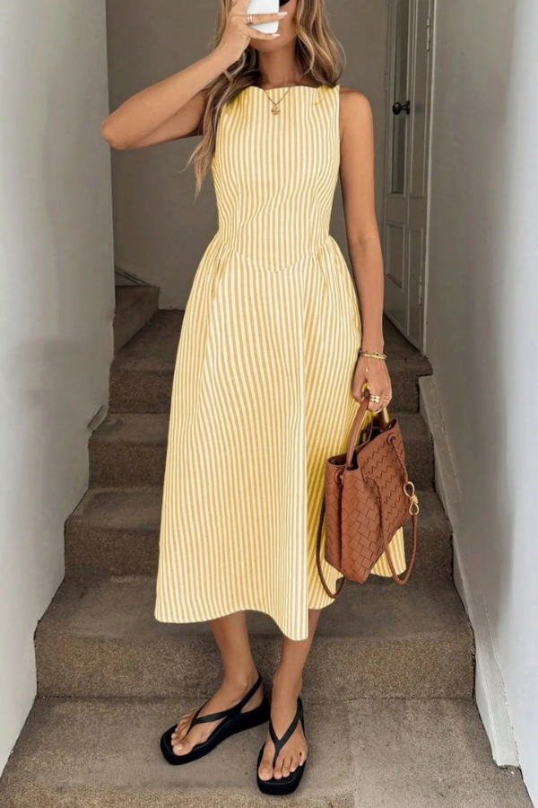 Stylish women's sleeveless striped midi dress with pleated skirt & halter neck for casual or day-to-night wear.