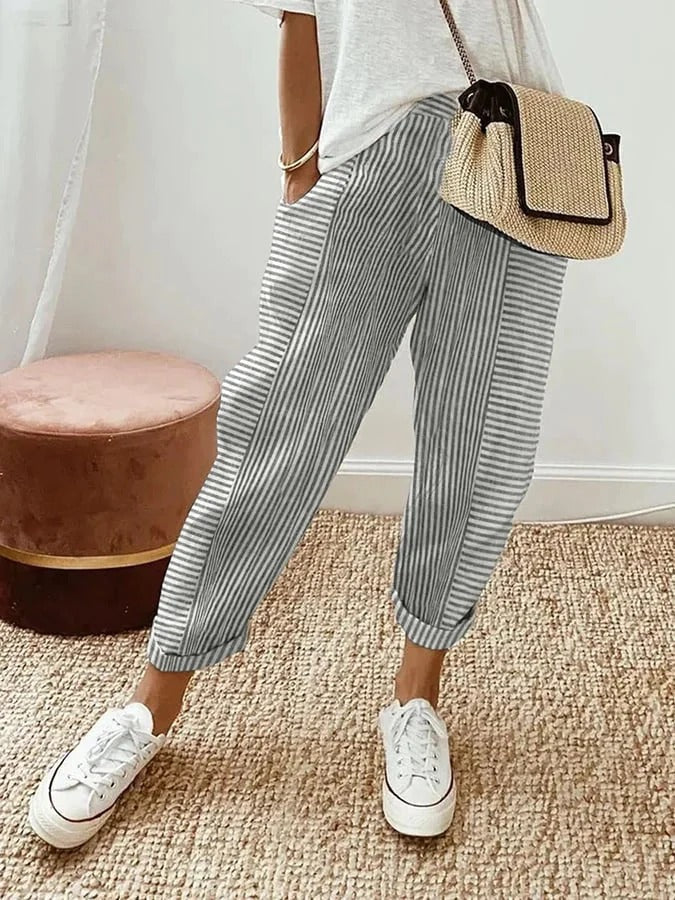 Stylish women's striped relaxed trousers, versatile for comfortable casual wear & everyday fashion.