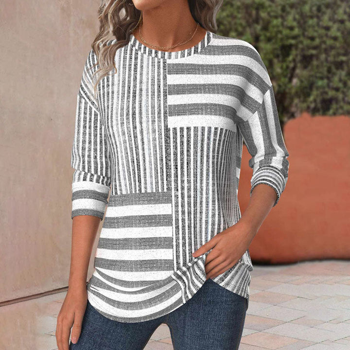 Women's striped short sleeve blouse in a relaxed fit for everyday casual comfort. Perfect for spring & summer style.