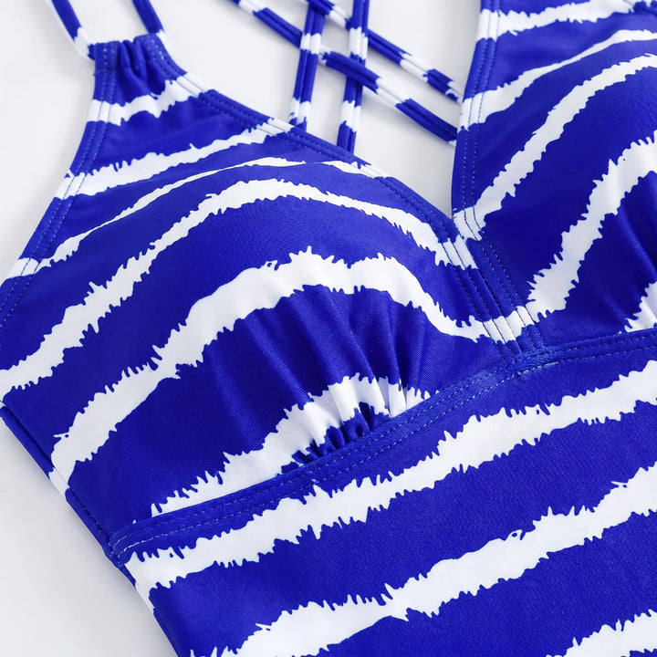 Women's two-piece striped tankini swimsuit featuring a comfortable top & flattering low-rise bottoms.