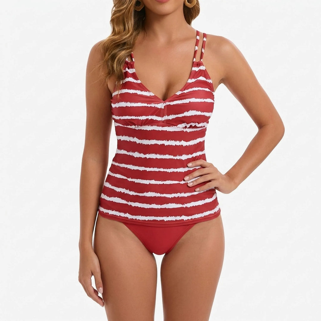 Fashionable women's striped tankini set, perfect beachwear or poolside fashion for summer vacations.