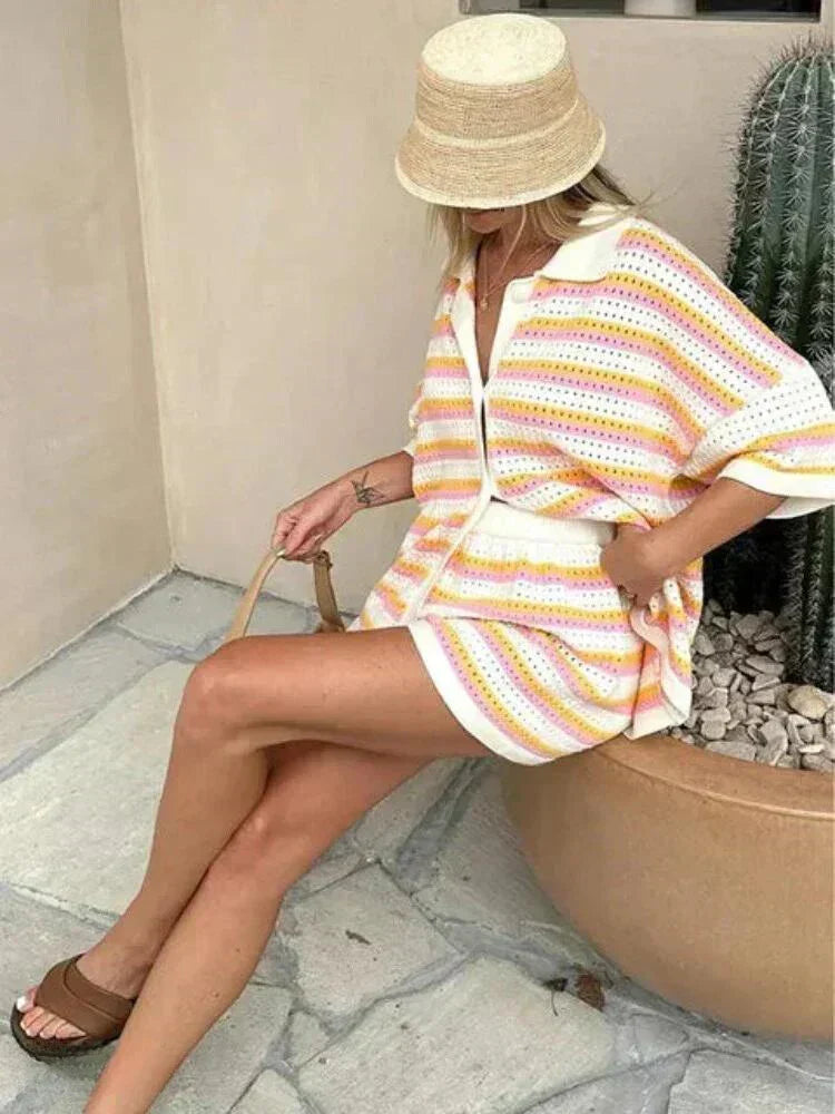 Women's striped two-piece outfit featuring a button-up top & elastic waist shorts for easy summer style.