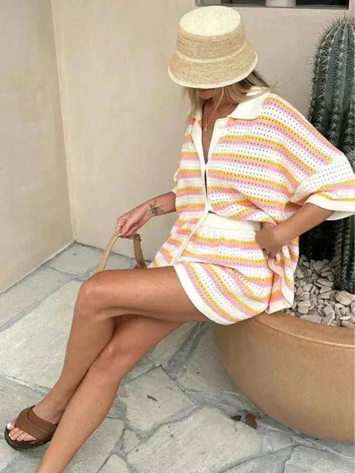 Women's striped two-piece outfit featuring a button-up top & elastic waist shorts for easy summer style.