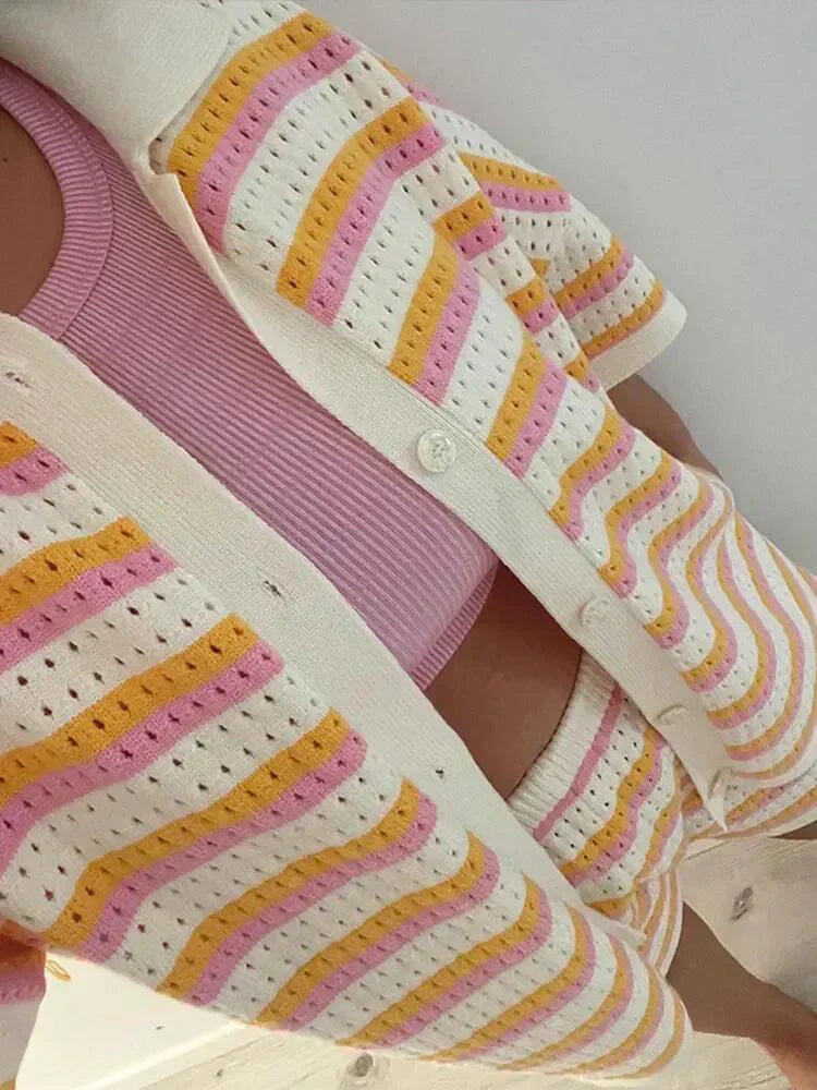 Chic women's striped two-piece shorts set. Casual summer outfit with a comfortable, relaxed fit.