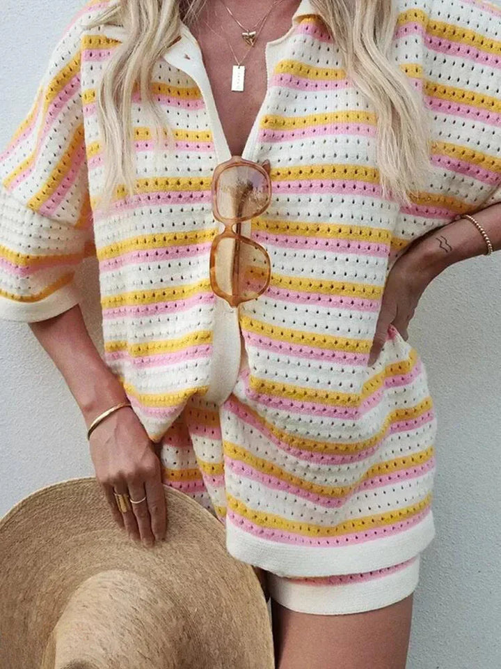 Matching women's striped two-piece shorts set for warm weather. Relaxed button-up top & elastic waist shorts.