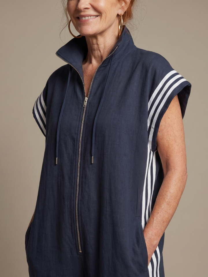 Women's fashionable striped jumpsuit with a full zip front, perfect for a stylish day out.