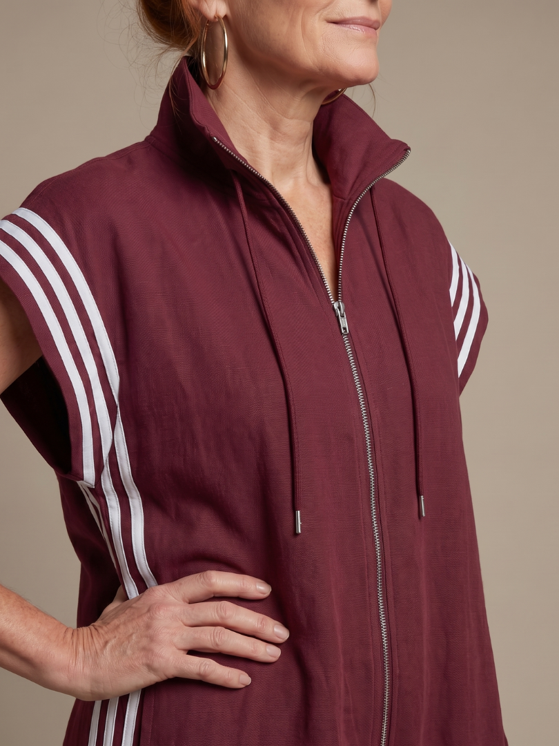 Fashionable striped one-piece for women, featuring a practical zip front design.
