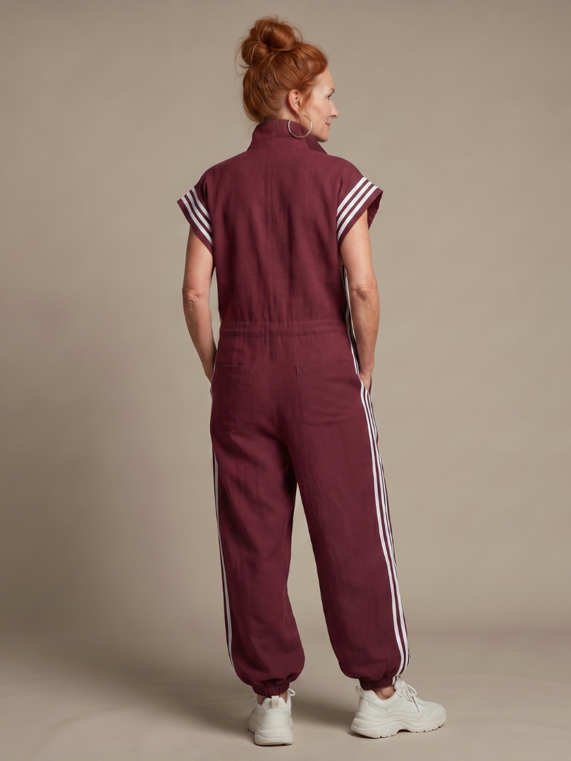 Comfortable women's workwear jumpsuit with a chic striped pattern and zip closure.