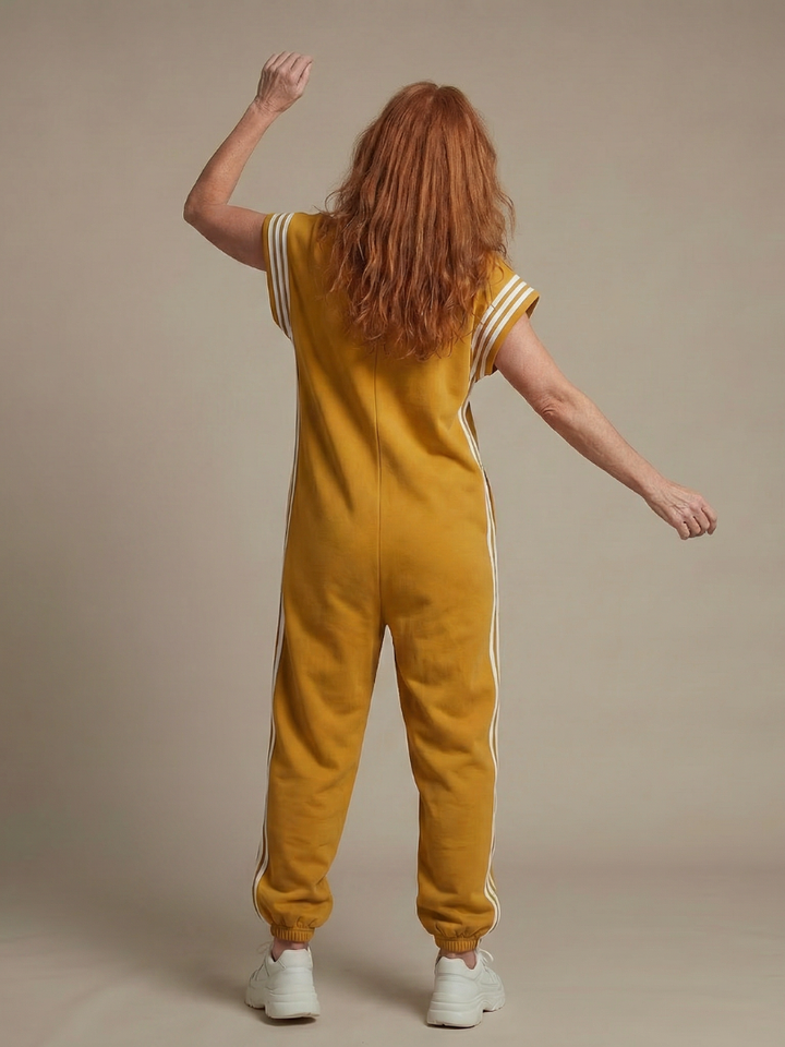 Modern women's striped one-piece, offering a fashionable look with a front zip.