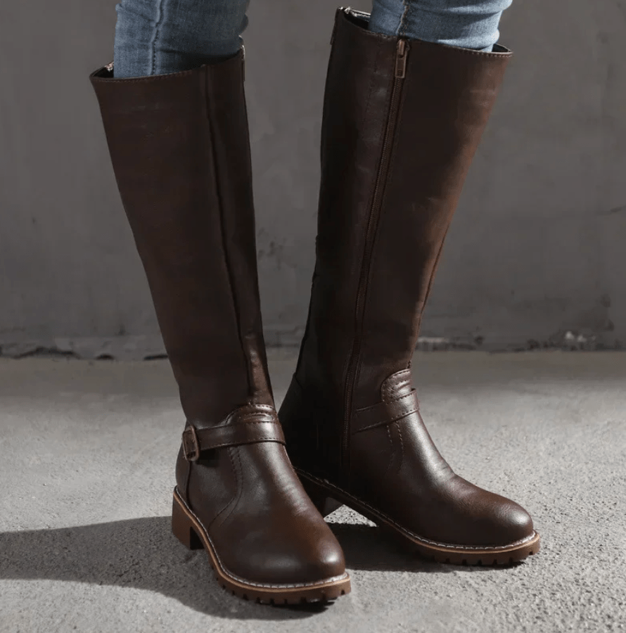 Interior view of women's boots, highlighting the plush comfort footbed and supportive gel insole.