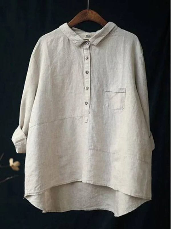 Casual women's long sleeve collared blouse with a unique asymmetrical hem design.