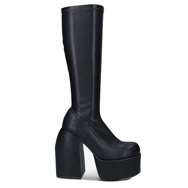 Women's stylish black heeled ankle boots. Perfect for versatile fashion & elevated style. Trendy chic footwear.
