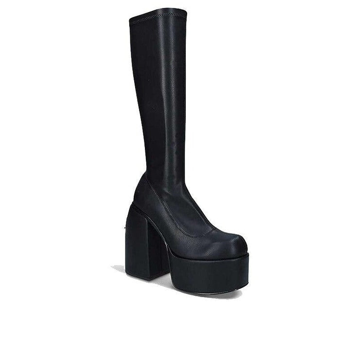 Chic black heeled boots for women, featuring a sleek design & comfortable fit. Elevate your fashion statement.