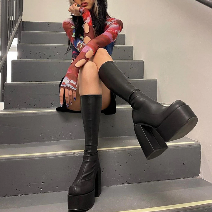 Trendy black heeled boots for women, designed to add sophisticated style. Versatile & perfect for any outfit.