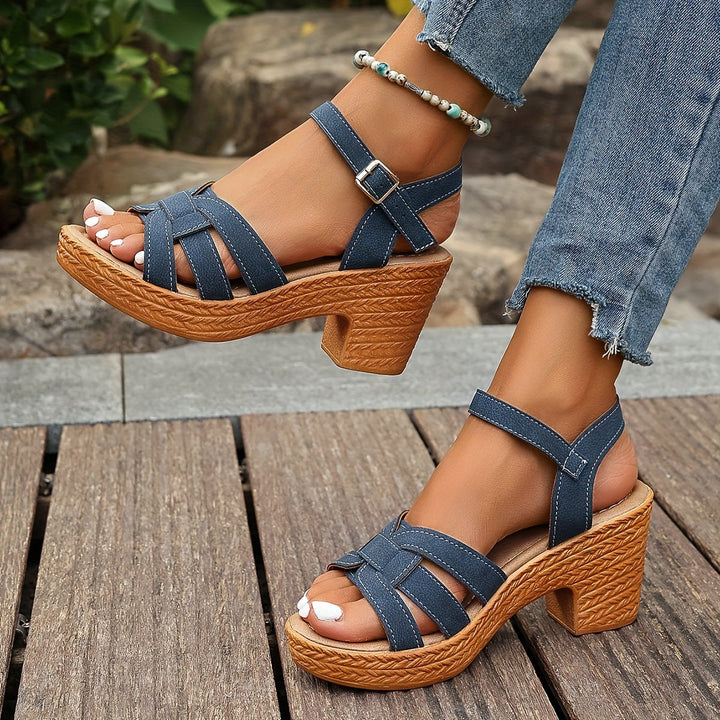 Women's comfortable wedge sandals with a sleek design, perfect for warm weather.