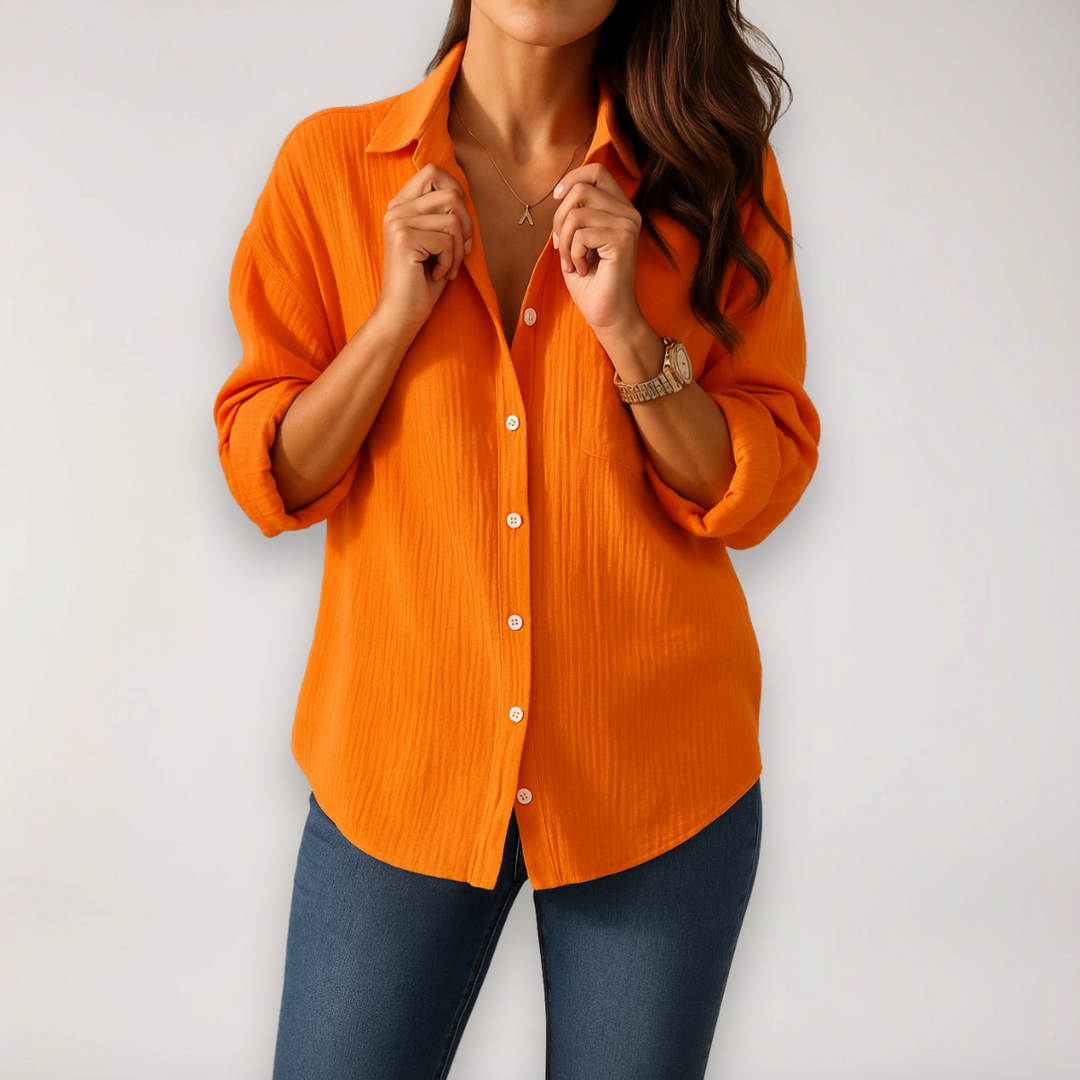 Pink women's stylish button blouse with roll-up sleeves, perfect for casual or office wear.