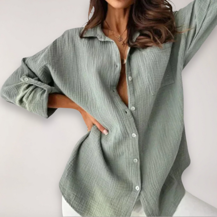 Grey women's comfortable button-down blouse with roll-up sleeves, versatile for office & casual.