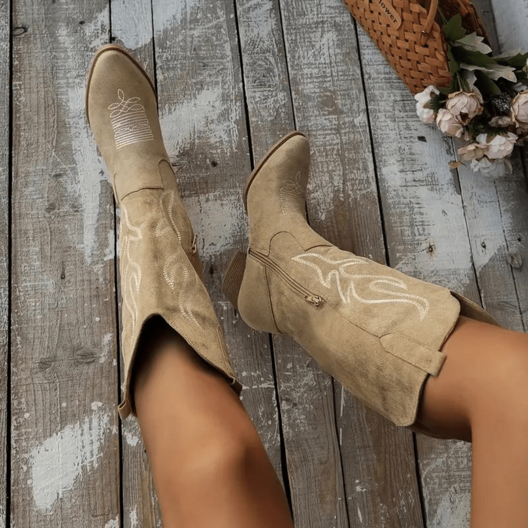 Women's stylish cowboy boots with easy side zipper and pointed toe for versatile fall fashion.