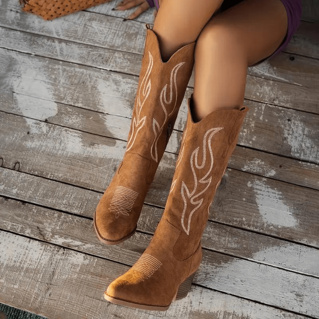 Casual yet stylish women's boots: classic cowboy silhouette with easy side zipper and embroidered details.