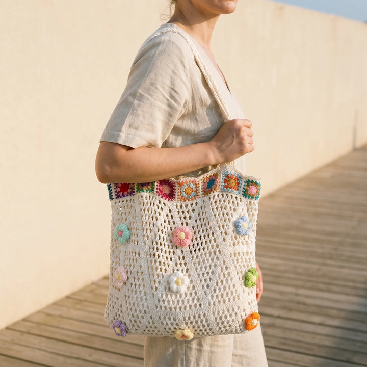 Women's stylish crochet flower tote bag, lightweight & perfect for summer casual wear.